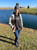woman in black leopard pray sweatshirt with shacket ontop