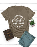 Surviving Motherhood One Prayer At a Time Tee